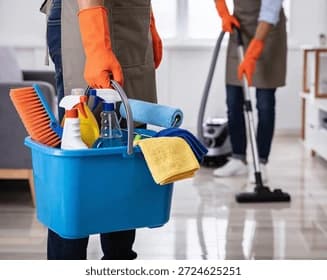 StrongHold team member with cleaning caddy